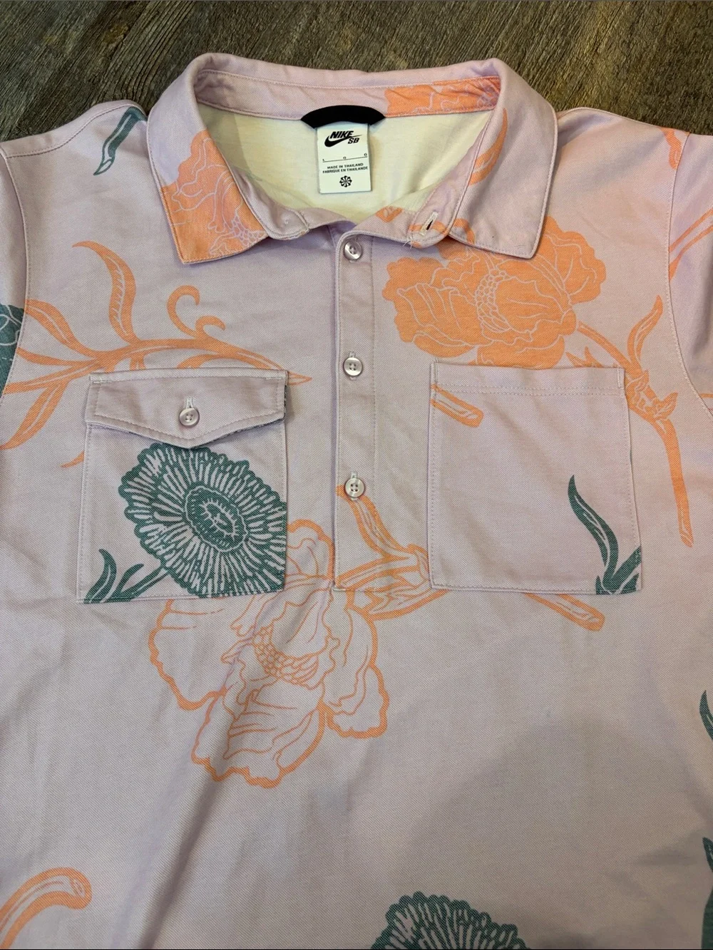 Nike Pink Floral Short-Sleeve Polo with Green and Peach Blooms